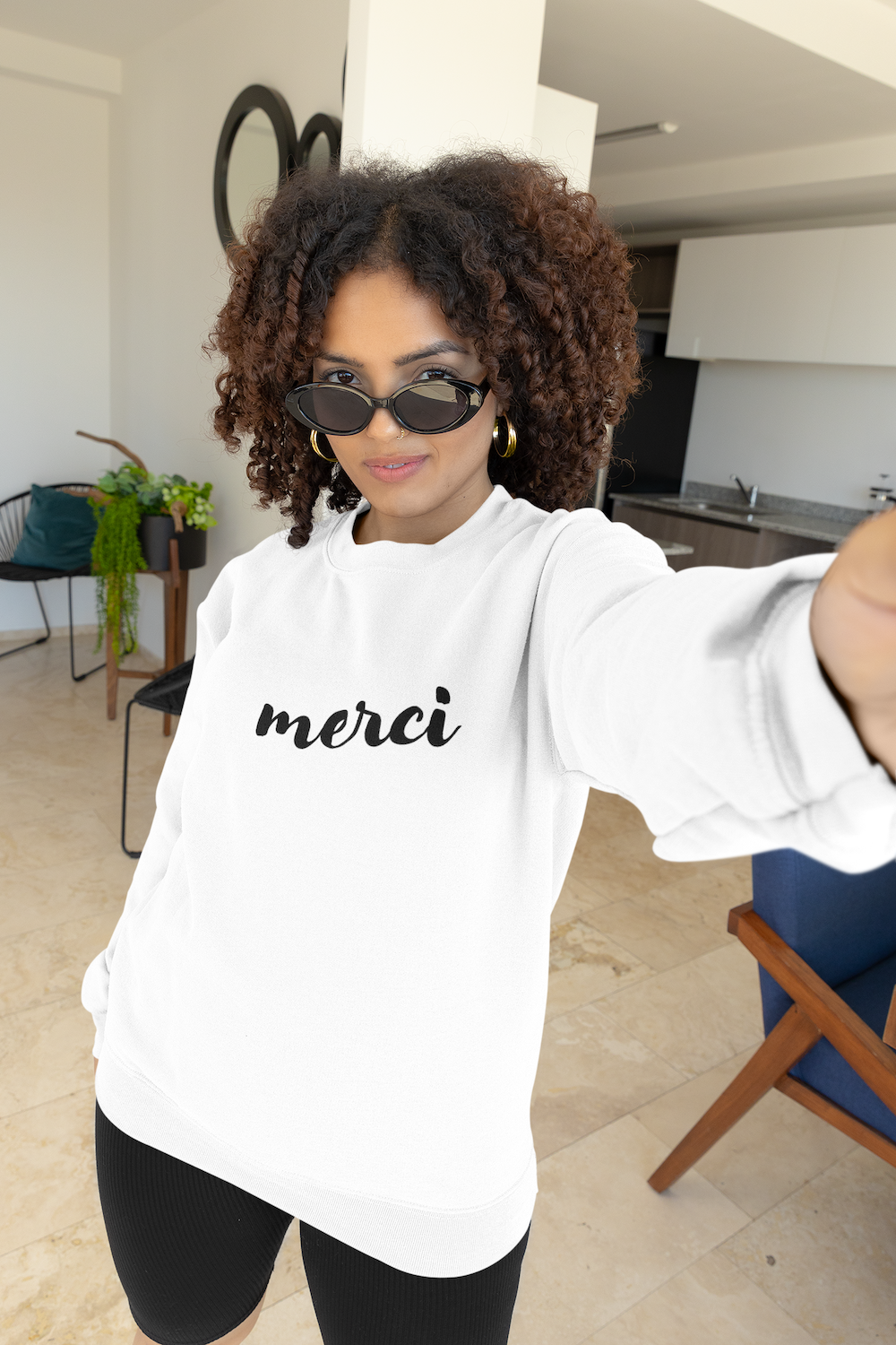 Woman Selfie wearing Merci white Sweatshirt