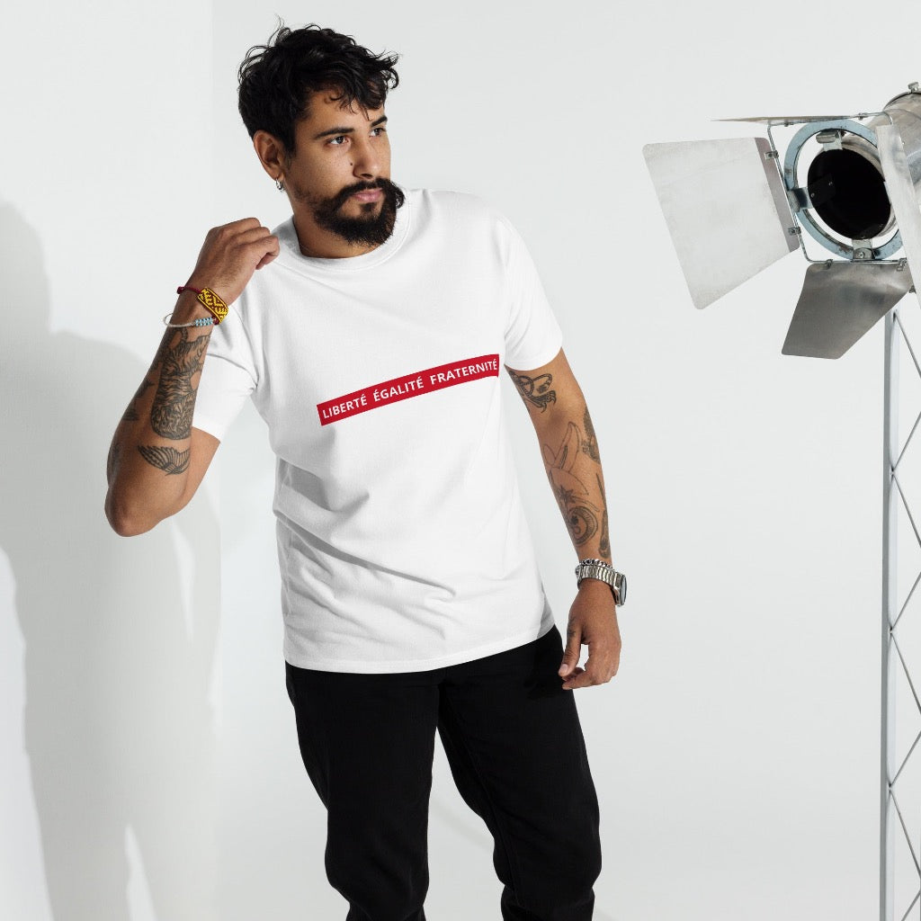 Standing Man wearing "Liberté Égalité Fraternité" White T-Shirt