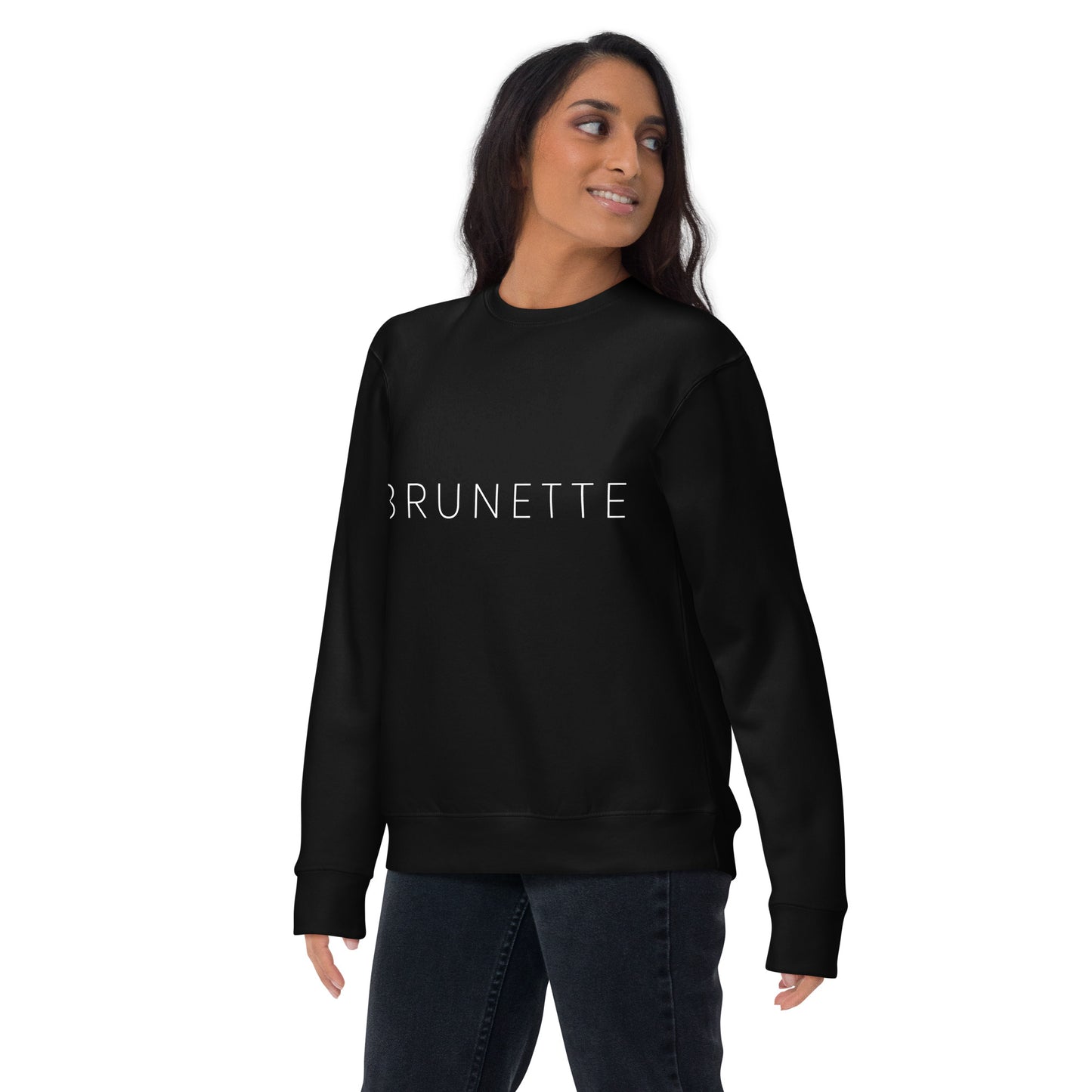 Woman wearing black sweatshirt with 'brunette" printed on the front