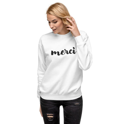 Woman wearing white Merci sweatshirt