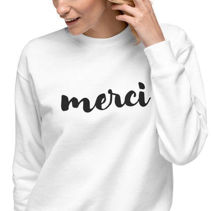 Close up woman wearing Merci sweatshirt