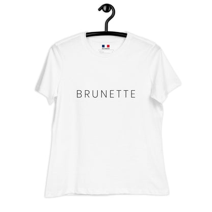 White T-shirt with "Brunette" printed on the front sitting on a hanger